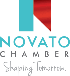 Novato Chamber logo with a blue and red icon above the words “Novato Chamber” and the slogan “Shaping Tomorrow.” written below.